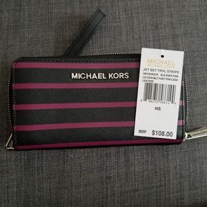 Michael Kors wallet with deep pink stripes